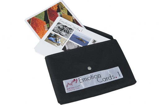 Open pouch and two EmotionCards, picture cards for fun workplace ice breakers and group reflection